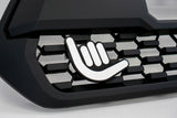 Shaka Grille Badge